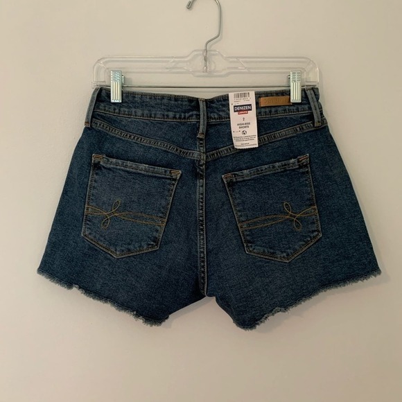 Levi’s high rise distressed stretchy jean shorts - Picture 2 of 8